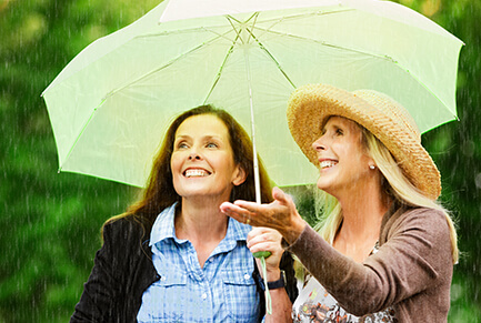 2 Women under an umbrella