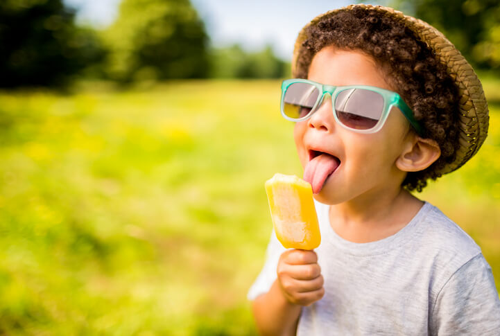 kid enjoying a popsicle
